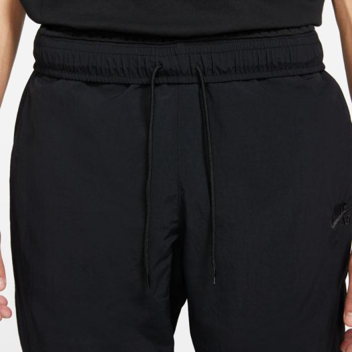 Šusťáky Nike SB NOVELTY TRACK PANT black/black